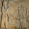 Assyrian – Frieze depicting a winged spirit a sargon or priest carrying – (MeisterDrucke-266639)